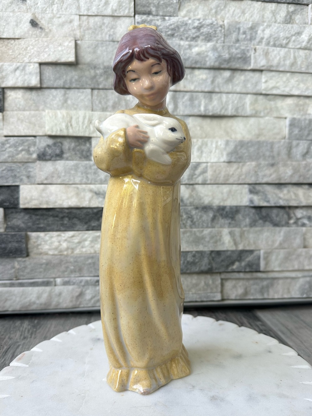 Porcelain Figurine Girl with Rabbit Figurine signed “Lyd”